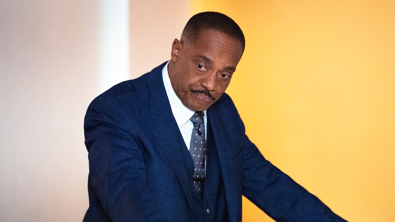 Vance looking down at NCIS bullpen