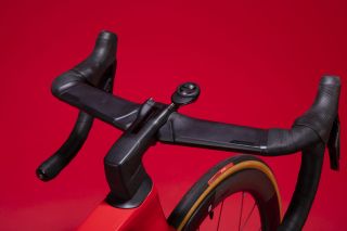 Image shows carbon handlebars on a road bike