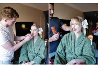 Actress Mckenna Grace wears a green robe while getting her makeup done.