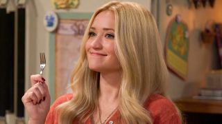 Emily Osment's Mandy holding a very tiny fork on Georgie & Mandy's First Marriage