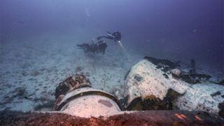 Here we see divers at the wreck of an American B-24 Liberator bomber that crashed into the sea near Malta in May 1943.