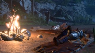 Characters sleep around a campfire in Baldur's Gate 3