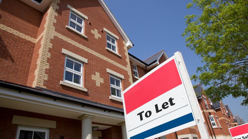 A house available with a To Let sign in front of it