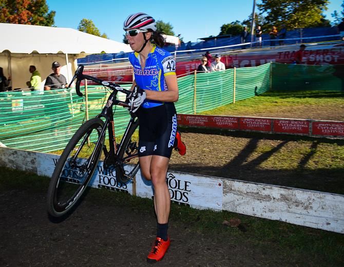 Helen Wyman (Kona) clearing the barriers on her last lap