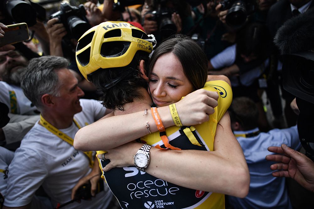 Geraint Thomas (Team Sky) celebrates his overall victory at the Tour de France with his wife