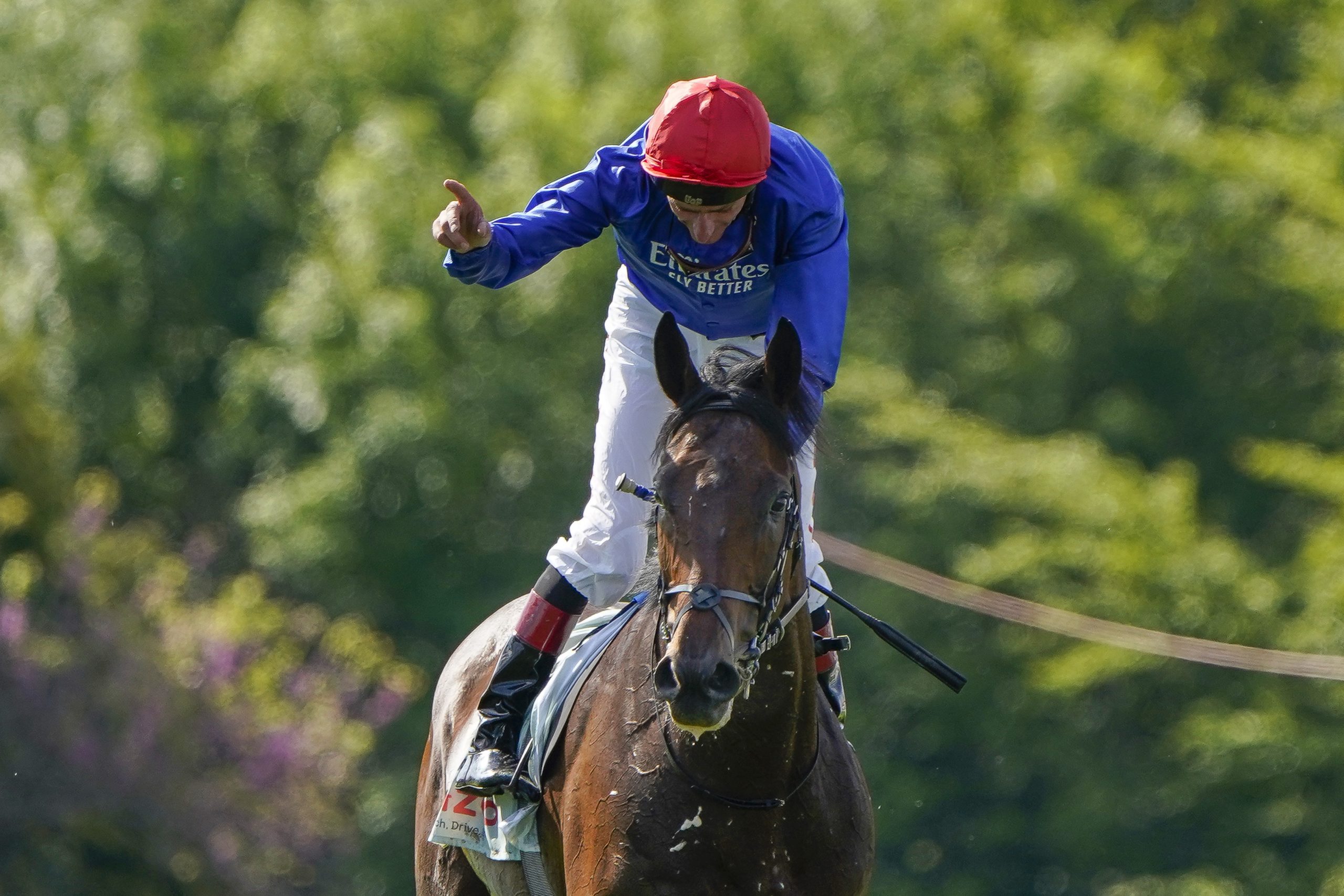 Epsom Derby 2021 winner EPSOM, ENGLAND - JUNE 05: Adam Kirby celebrates after riding Adayar to win The Cazoo Derby at Epsom Racecourse on June 05, 2021 in Epsom, England. Due to the Coronavirus pandemic, only owners along with a limited number of the paying public will be allowed to attend the meeting. (Photo by Alan Crowhurst/Getty Images)