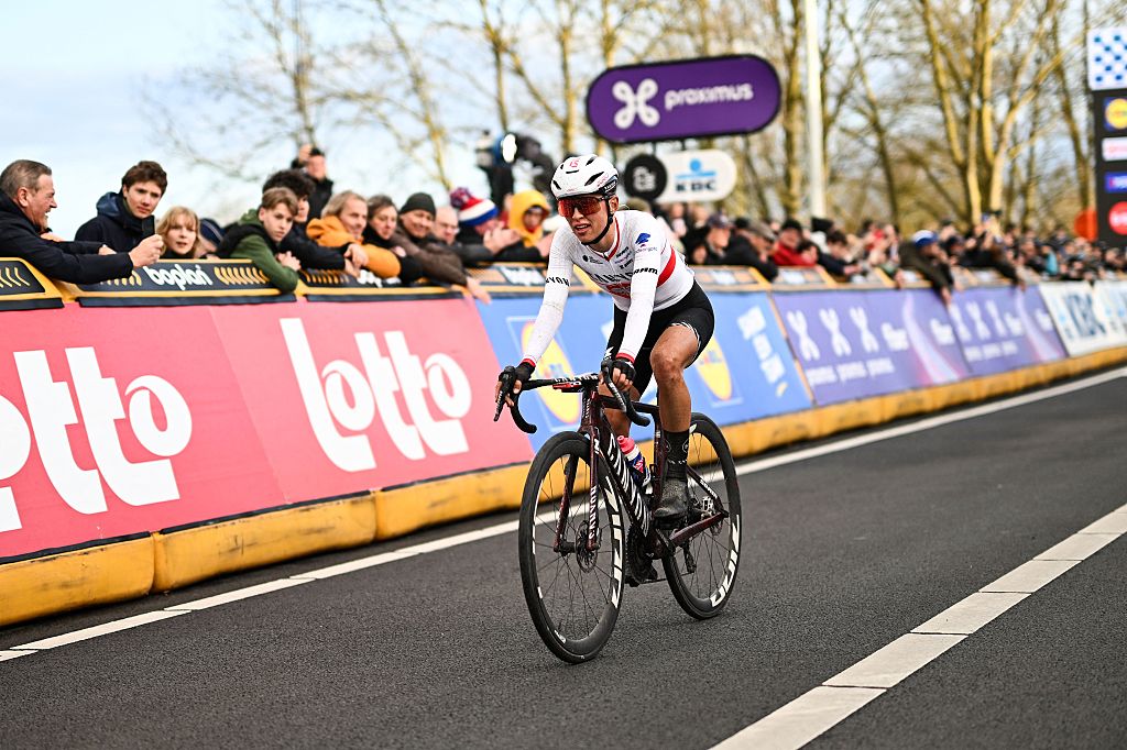Polish Katarzyna Niewiadoma-Phinney of CANYON//SRAM Zondacrypto crosses the finish line of the women's one-day cycling race Omloop Het Nieuwsblad (UCI World Tour), the opening race of the Flemish one-day classics season, 137,6 km from Gent to Ninove, Saturday 28 February 2026. BELGA PHOTO MAARTEN STRAETEMANS (Photo by MAARTEN STRAETEMANS / BELGA MAG / Belga via AFP)