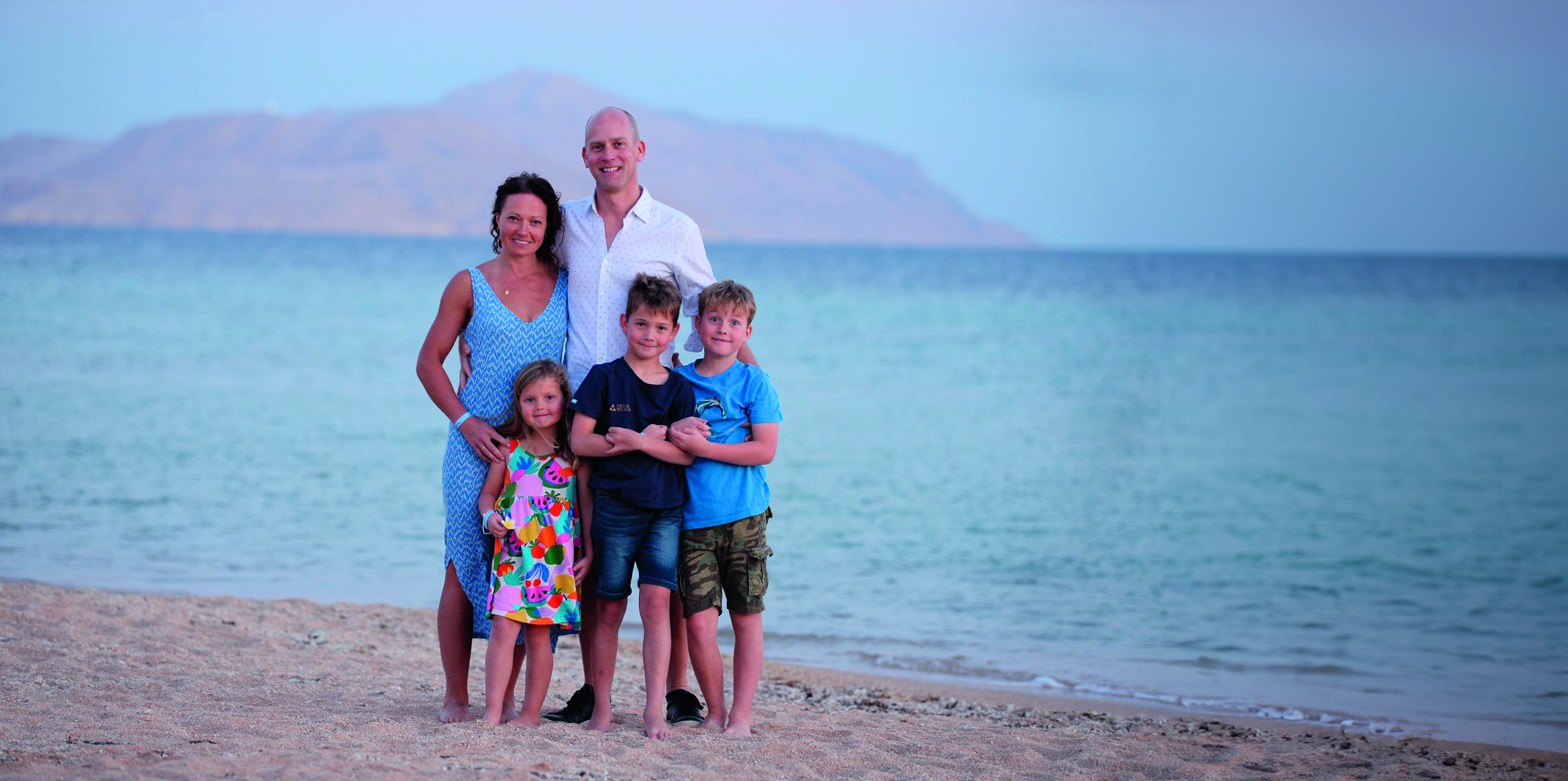 Felicity Ashley on beach with family