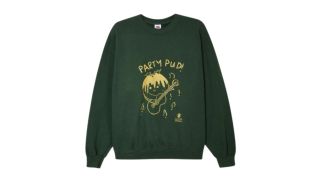 best christmas jumpers illustrated by a green sweatshirt with a Christmas pudding on it