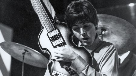 Paul McCartney of English rock and pop group The Beatles tunes up his Hofner 500/1 violin bass guitar on stage during rehearsals for the ABC Television music television show 'Thank Your Lucky Stars' Summer Spin at Teddington Studios in London on 11th July 1964. The band would go on to play four songs on the show, A Hard Day's Night, Long Tall Sally, Things We Said Today and You Can't Do That.