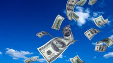 money flying in blue sky for Powerball lottery