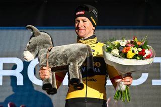 Tiesj Benoot, winner of the 2023 Kuurne-Brussel-Kuurne with the traditional donkey prize