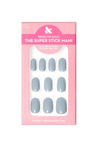 A pack of Olive & June's Super Stick Mani fake nails set against a white background.