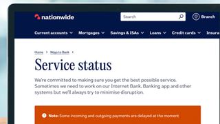 A laptop screen showing the Nationwide banking page reporting issues