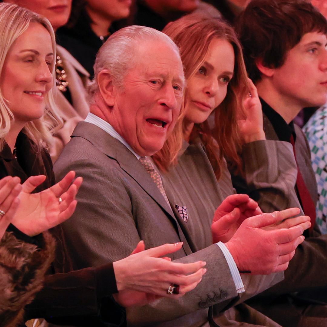 King Charles clapping in the front row at London Fashion Week