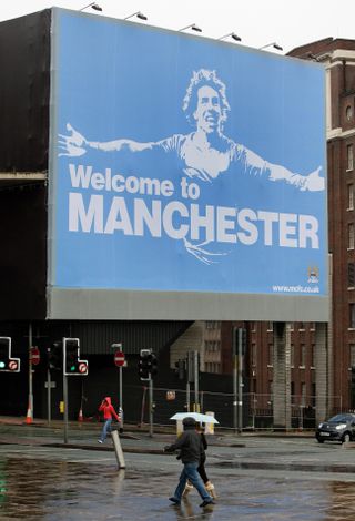 City paid for a provocative billboard after poaching Carlos Tevez from arch-rivals Manchester United