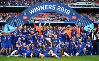 Chelsea celebrate with the trophy after winning the 2018 FA Cup final against Manchester United at Wembley