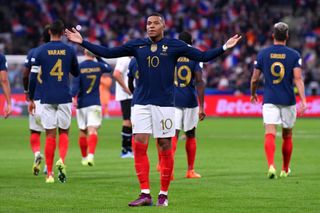 Kylian Mbappe of France celebrates after scoring their side's first goal during the UEFA Nations League League A Group 1 match between France and Austria at Stade de France on September 22, 2022 in Paris, France.