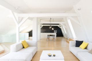 An attic with dining and living room