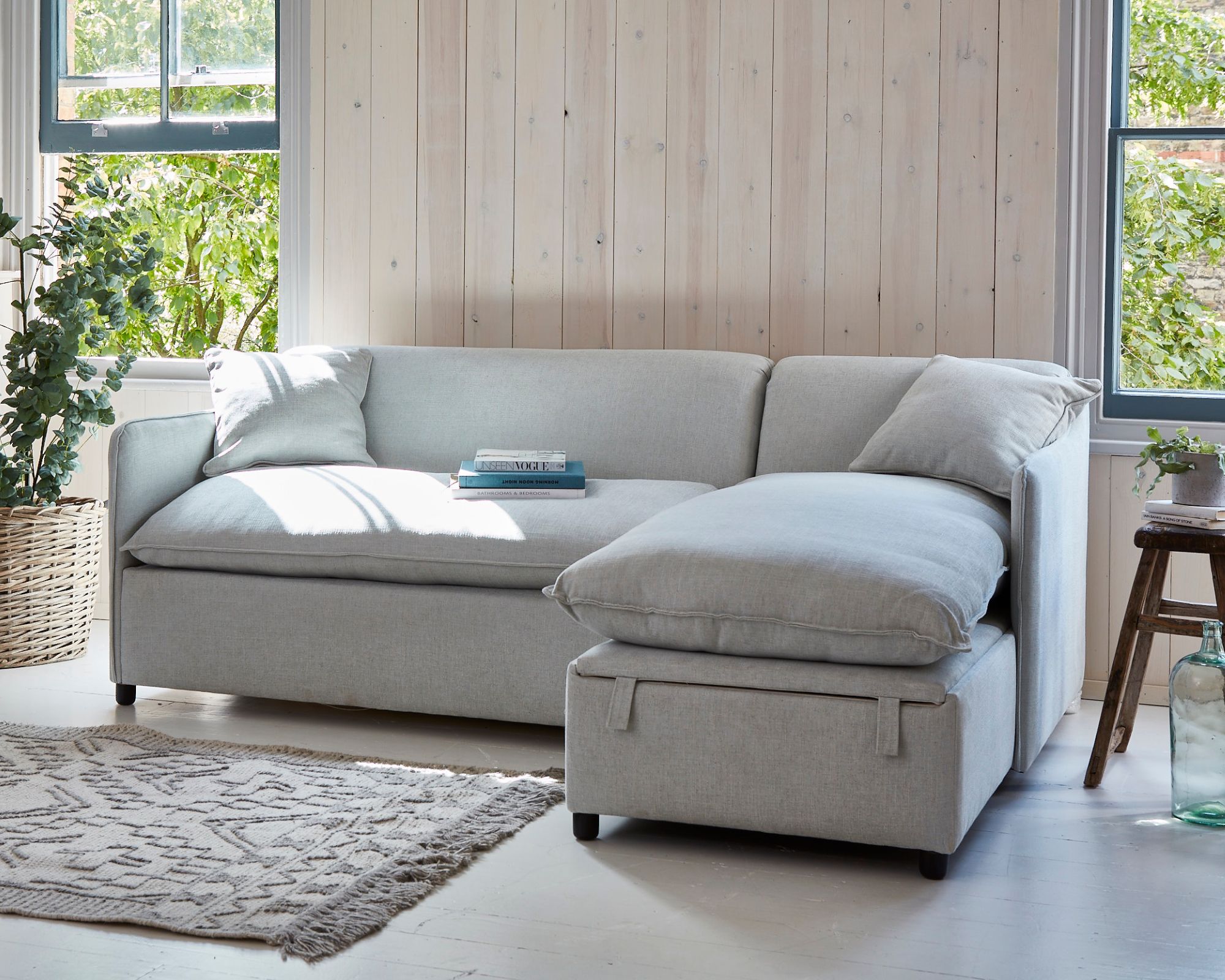 A L-shaped grey sofa