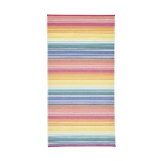 A rainbow striped beach towel