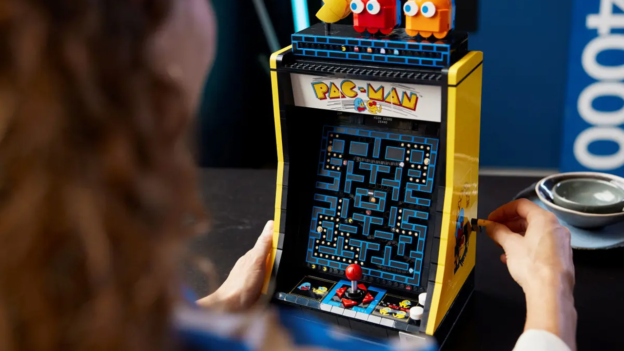 Lego Pac-Man Arcade being played by a woman