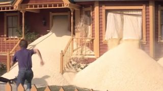 The finale of Real Genius with popcorn flowing out of a house. 