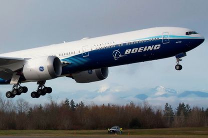 A Boeing 777X airplane takes off on its inaugural flight at Paine Field in Everett, Washington on January 25, 2020