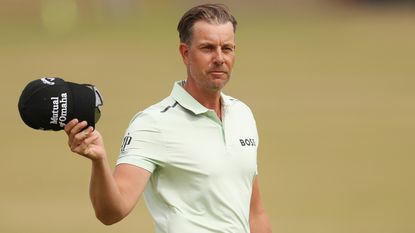 Henrik Stenson acknowledges the crowd on the first green during the Celebration of Champions prior to The 150th Open at St Andrews Old Course