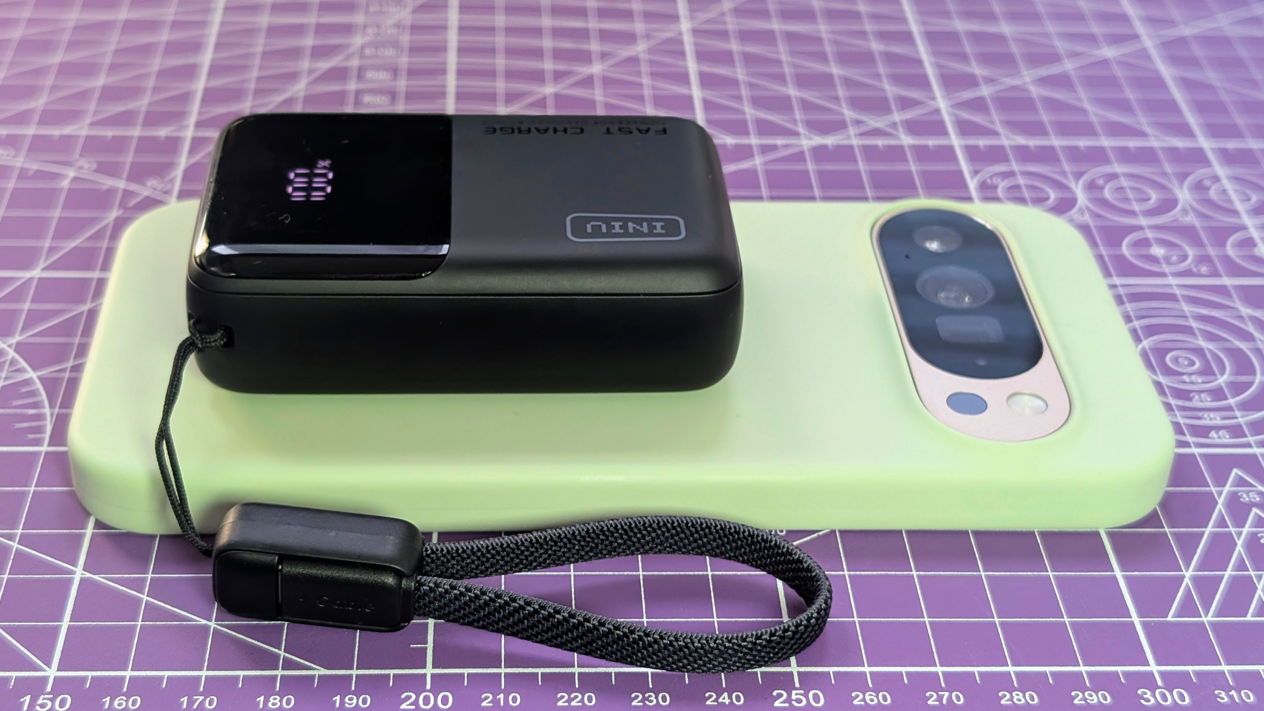 Iniu P50-E1 45W power bank compared to Pixel 10 Pro XL