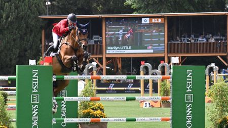Marilyn Little and La Contessa jumping a fence