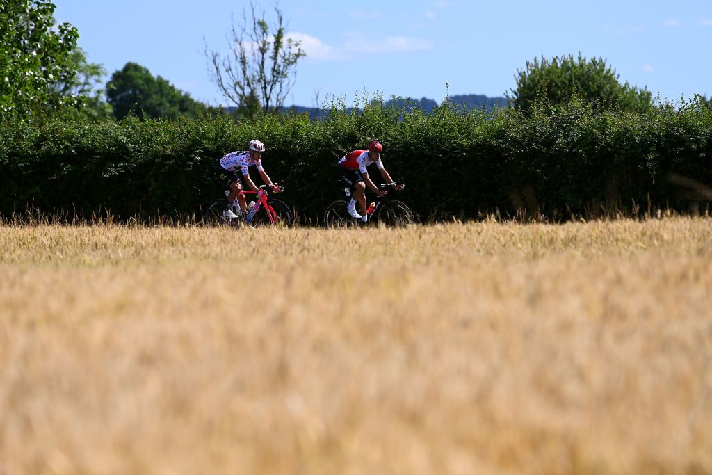 CALAIS FRANCE JULY 05 LR Magnus Cort Nielsen of Denmark and Team EF Education Easypost Polka Dot Mountain Jersey and Anthony Perez of France and Team Cofidis competing in the breakaway during the 109th Tour de France 2022 Stage 4 a 1715km stage from Dunkerque to Calais TDF2022 WorldTour on July 05 2022 in Calais France Photo by Tim de WaeleGetty Images