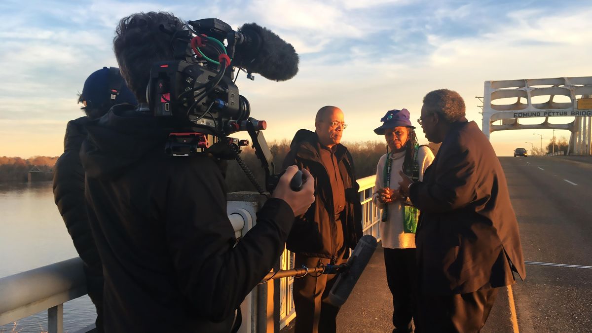 Jeffery Robinson with civil rights activist and lawyer Faya Ora Rose Touré and Senator Henry &quot;Hank&quot; Sanders on the Edmund Pettus Bridge in Selma, Alabama.