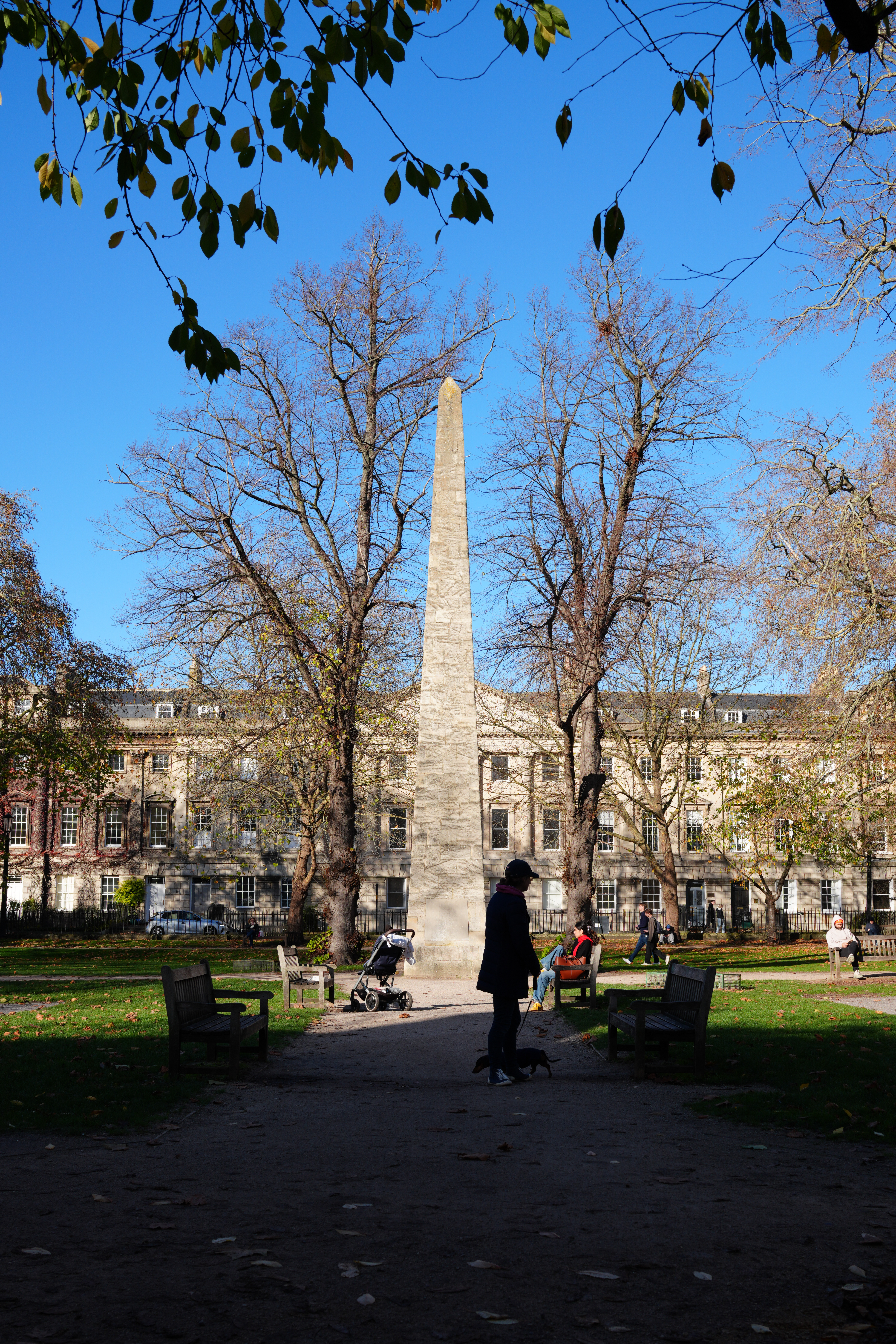 A photo of an obelisk on a sunny day