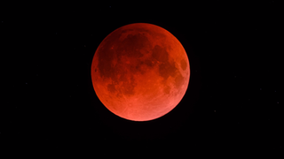 The blood moon shines dramatically in a lunar eclipse from 2022.