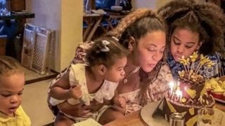 Beyonce with her three kids