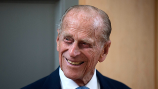 Prince Philip, Duke of Edinburgh, smiles after unveiling a plaque at the end of his visit to Richmond Adult Community College in Richmond on June 8, 2015 in London, England