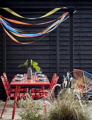 colourful garden furniture ideas: red habitat outdoor dining set