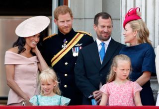 Prince Harry, Meghan Markle, Peter Phillips and Autumn Phillips and their children Savannah and Isla