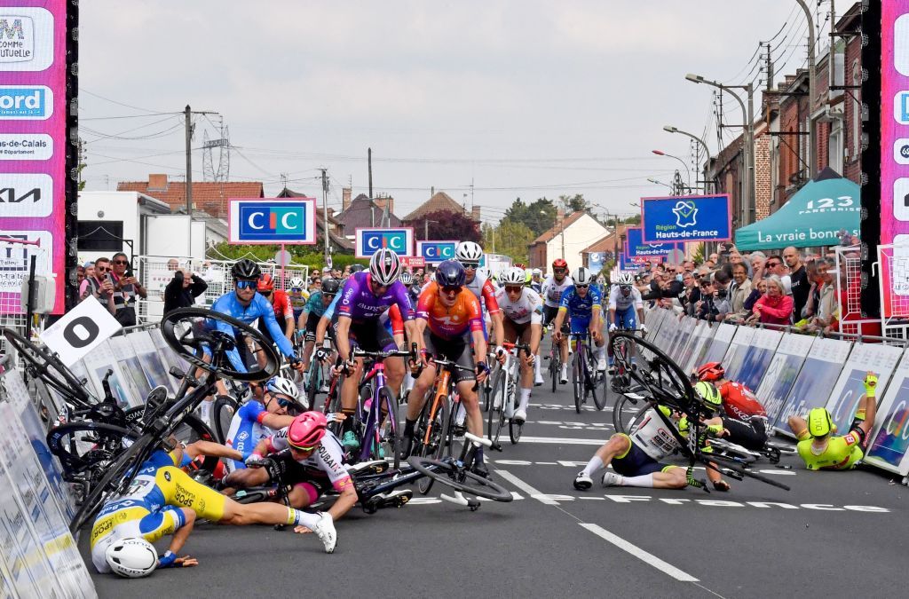 Riders crash as they cross the finish line during the 161 km between Dunkirk and Aniche first stage of the 4 jours de Dunkerque Four days of Dunkirk cycling race in Aniche northern France on May 3 2022 Dutch rider Arvid de Kleijn Human Powered Health was declared winner of the first stage of the Four Days of Dunkerque on May 3 2022 in Aniche after Australian rider Sam Welsford was dropped Welsford Team DSM was the first to cross the line but was considered responsible for the crash that sent Arnaud De Lie Lotto Soudal and Daniel McLay Arkea Samsic to the ground Photo by FRANCOIS LO PRESTI AFP Photo by FRANCOIS LO PRESTIAFP via Getty Images