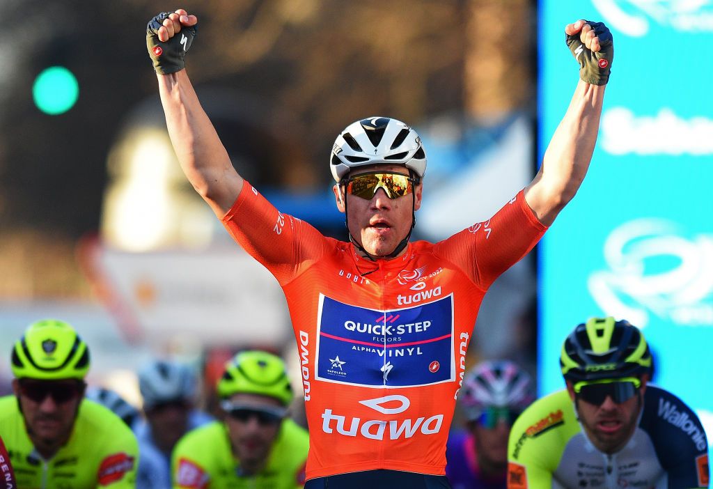 VALENCIA SPAIN FEBRUARY 06 Fabio Jakobsen of Netherlands and Team QuickStep Alpha Vinyl Orange Points Jersey celebrates winning ahead of Elia Viviani of Italy and Team INEOS Grenadiers and Alexander Kristoff of Norway and Team Intermarch Wanty Gobert Matriaux during the 73rd Volta A La Comunitat Valenciana 2022 Stage 5 a 92km stage from Paterna to Valencia VCV2022 on February 06 2022 in Valencia Spain Photo by Dario BelingheriGetty Images