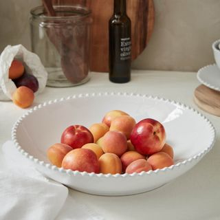 Pearl pasta serving bowl with fruit inside