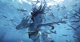 Trinity Jo-Li Bliss as Tuktirey Sully, swimming, in Avatar: The Way of Water