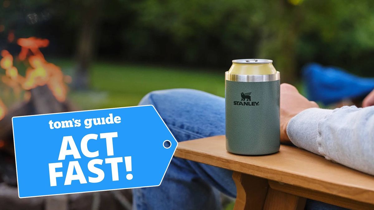 man drinking beer outdoors