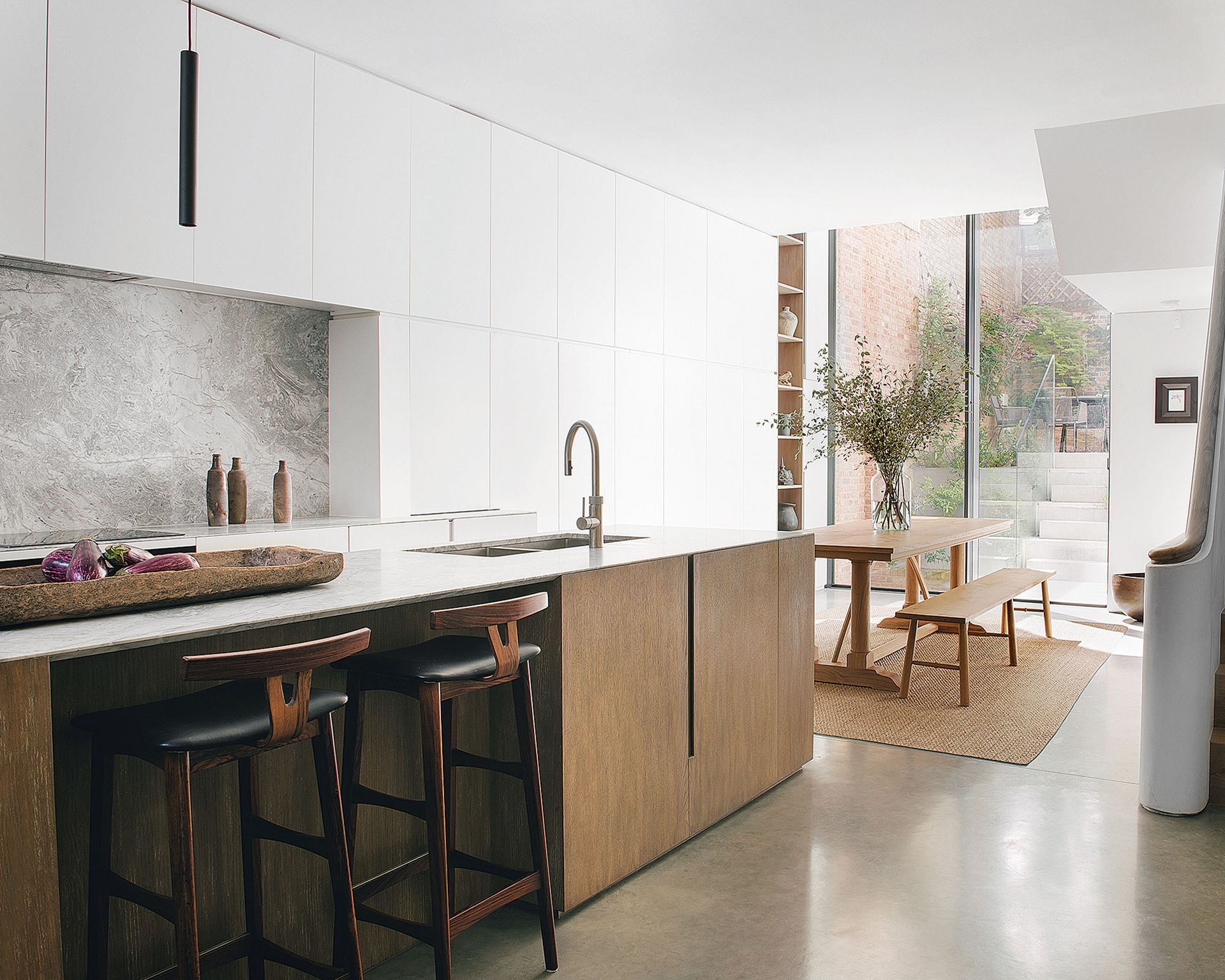 large wooden kitchen with island and induction hob