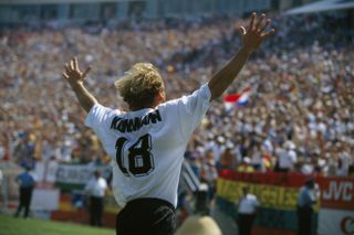 Jurgen Klinsmann celebrates after scoring for Germany against Bolivia at the 1994 World Cup.