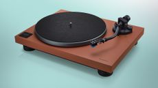 Technics SL-40CBT direct drive turntable on a green/blue background