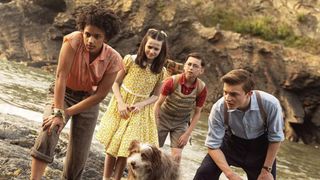 Diaana Babnicova as George, Elliott Rose as Julian, Kit Rakusen as Dick and Flora Jacoby Richardson as Anne with Timmy the dog in The Famous Five