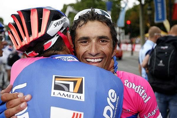 Bennati gets the congrats from a team-mate.