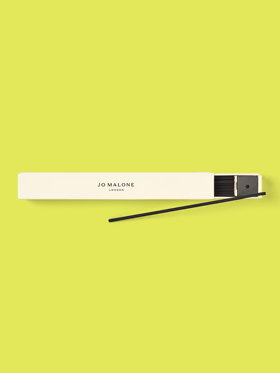 A set of dark amber incense sticks and a mini holder from Jo Malone London